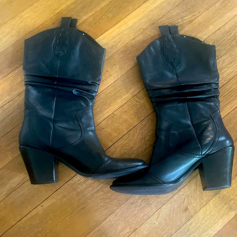 Leather western style boots, size 10 great white spot on top of boot. See pic